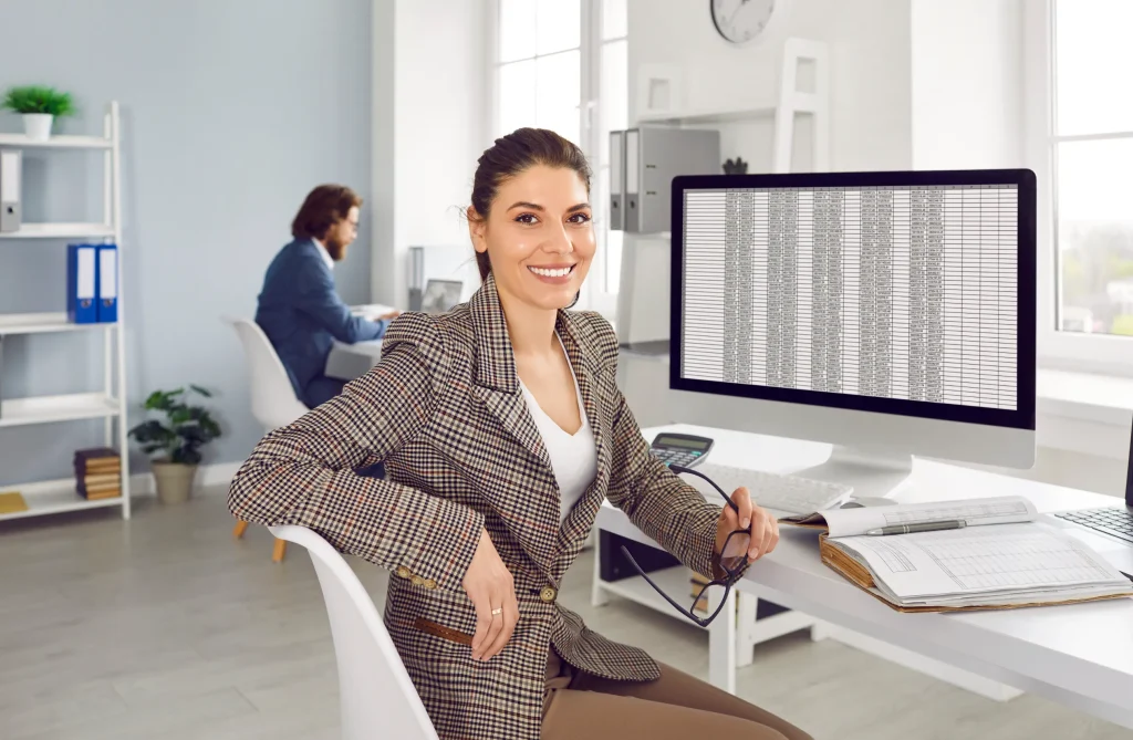 Woman sitting at a computer desk